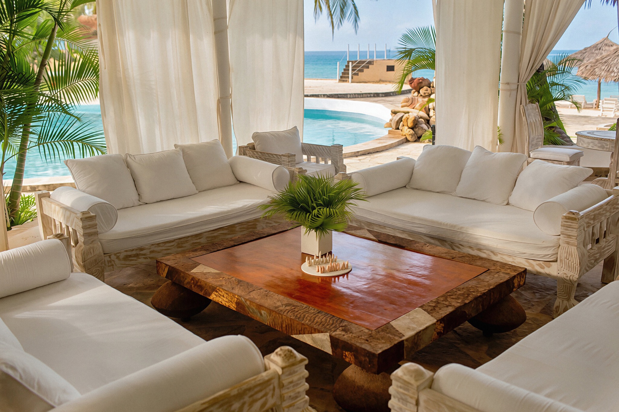 Open living room overlooking the pool